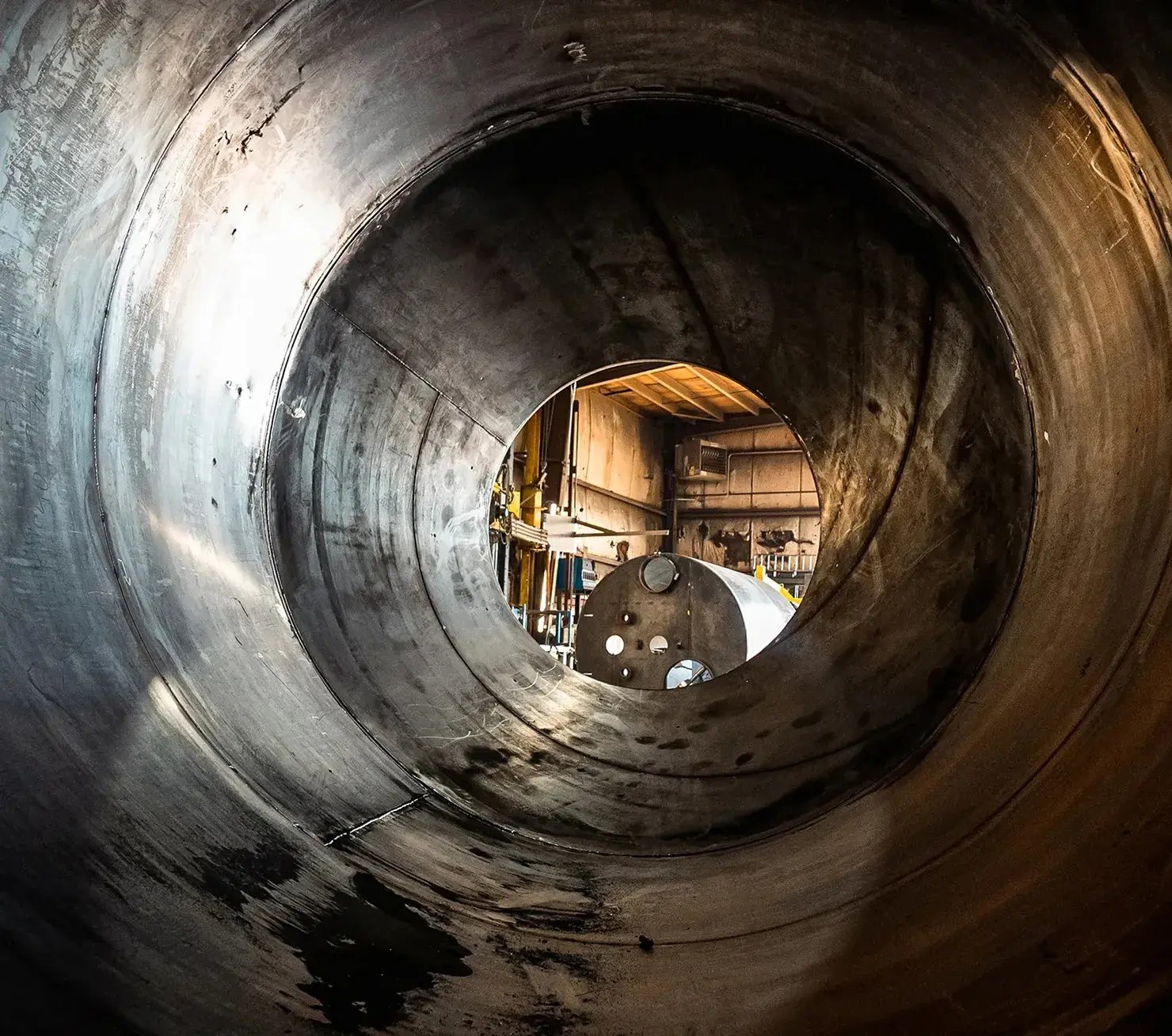 metal-pipe-interior-looking-into-factory